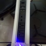 Motorized pop up cable cabby for conference table